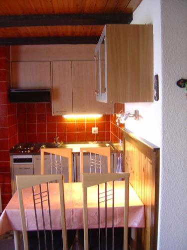 Kuchyň nebo kuchyňský kout v ubytování Soleil Wohnung