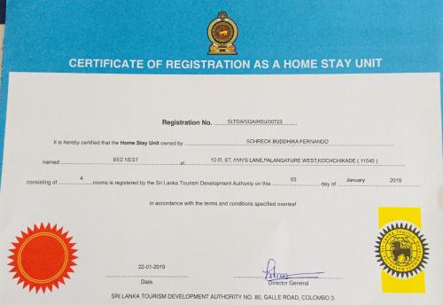 a certificate of registration as a home stay unit on a envelope at Bee Nest Bed & Breakfast in Negombo