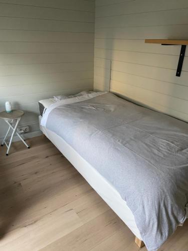Chalet Eau Vive Meinekomにあるベッド