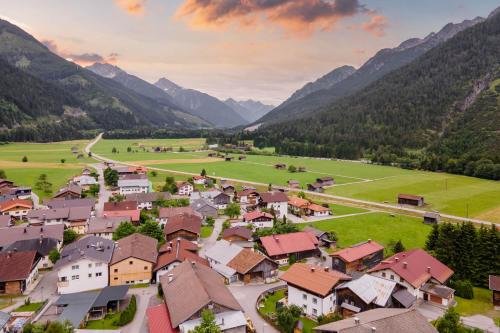 an aerial view of a village in the mountains at Ferienwohnung Heidi in Elmen