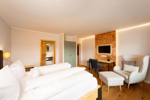 Кровать или кровати в номере freistil Boutiquehotel