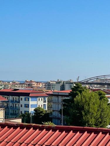 a view of a city with buildings and a bridge at B&B Marrelli Crotone in Crotone