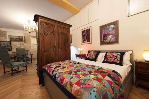 Ένα ή περισσότερα κρεβάτια σε δωμάτιο στο Bric Broc