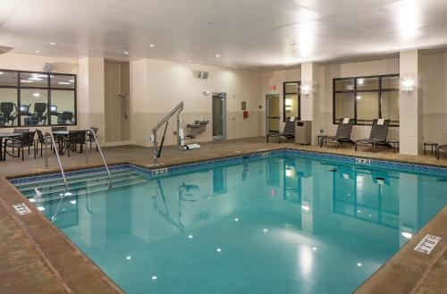 a large swimming pool in a hotel room at Hyatt Place Lincoln/Downtown-Haymarket in Lincoln