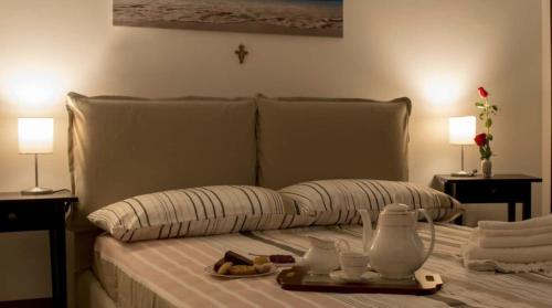 En eller flere senge i et værelse på Casa Mariagrazia House Etna Mare Presa Piedimonte