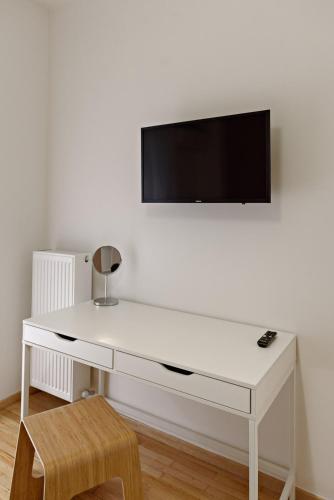 TV a/nebo společenská místnost v ubytování Blu & Marrone Suites-parking included