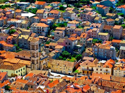 an aerial view of a city with buildings at Apartments Tudor Nikola in Hvar