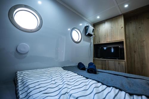 Rezidence Malše - Unikátní apartmány na voděにあるベッド