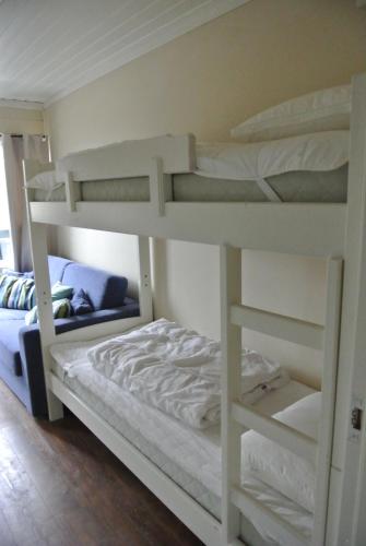a bedroom with two bunk beds in a room at Trysil Alpin 16A Top location in Trysil