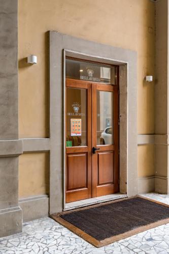 an entrance to a building with a wooden door at Antica Terrazza Frascati in Frascati