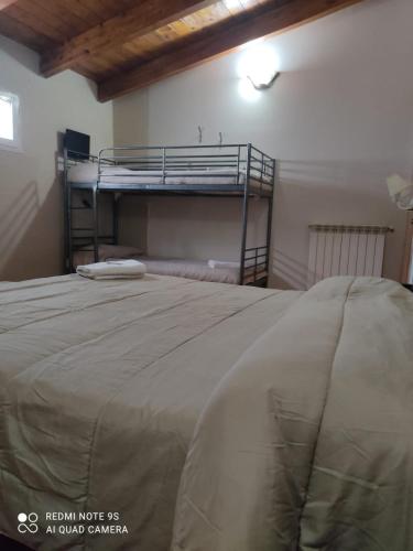 Postel nebo postele na pokoji v ubytování Hotel Stefany