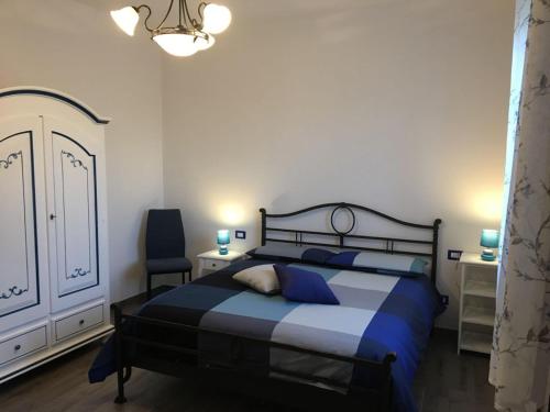 Ένα ή περισσότερα κρεβάτια σε δωμάτιο στο Ca’ di Matt
