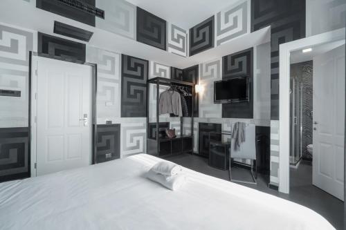 Katil atau katil-katil dalam bilik di Hotel Deco