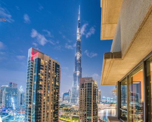 a city with tall buildings and skyscrapers at Bella Vista - 29 Boulevard Downtown Burj Khalifa in Dubai