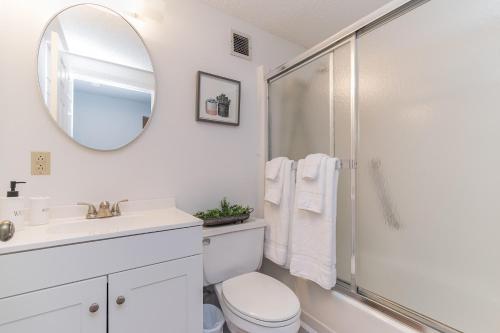 a bathroom with a shower and a toilet and a sink at Handsome 2BR Condo with Gorgeous Views in Sugar Mountain! condo in Sugar Mountain