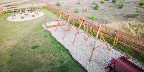 an aerial view of a park with a playground at Domek u Lipków na Kaszubach "Iga" JACUZZI in Lipusz