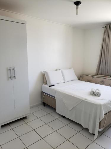 A bed or beds in a room at APT BEIRA MAR NEO 2.0