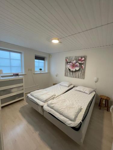 Postel nebo postele na pokoji v ubytování Båstad