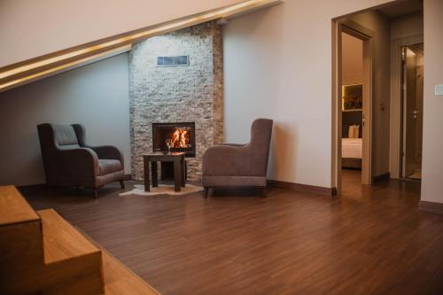 Posezení v ubytování Peerless Villas Hotel