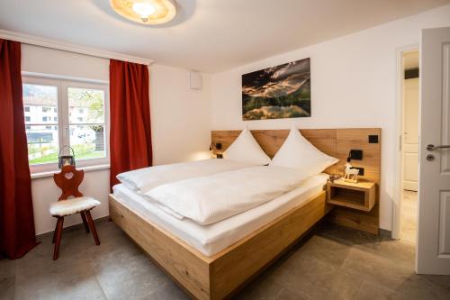 Un pat sau paturi într-o cameră la Alpin Supreme