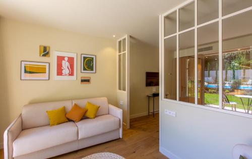 Ein Sitzbereich in der Unterkunft La Villa du Moulleau