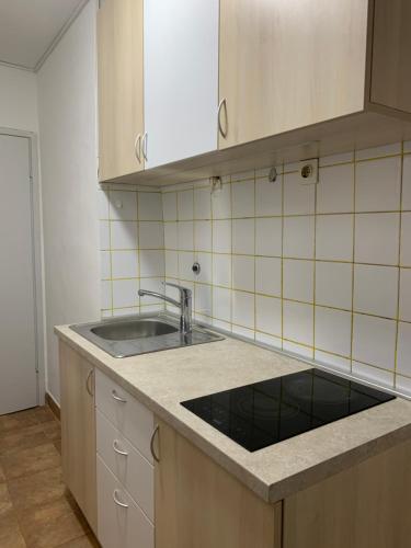 مطبخ أو مطبخ صغير في New episode - apartment with private parking