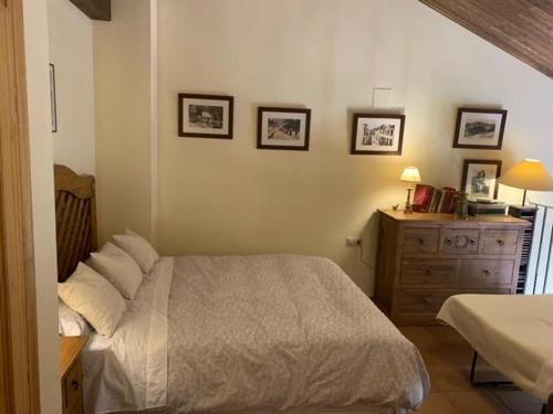 Postel nebo postele na pokoji v ubytování Apartamentos Valdelinares