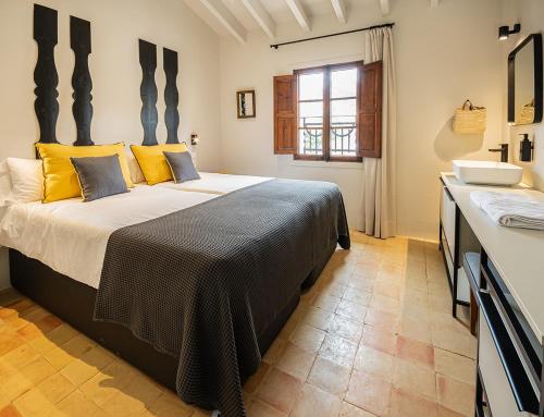 Posteľ alebo postele v izbe v ubytovaní Unic - Turisme d'interior