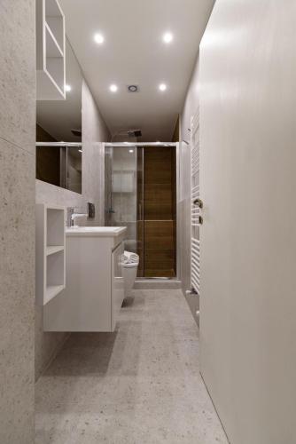 Kuchyň nebo kuchyňský kout v ubytování Blu & Marrone Suites-parking included