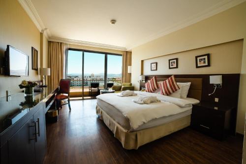 Oryx Hotel Aqabaにあるベッド
