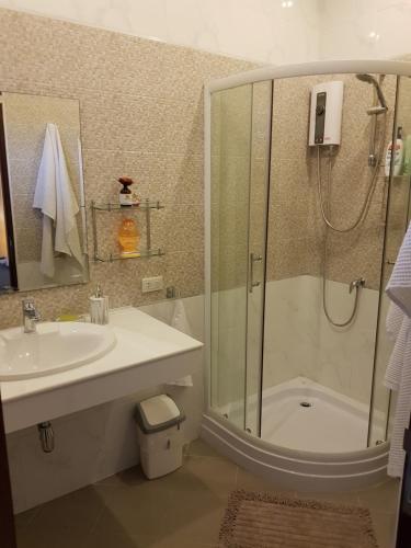a bathroom with a shower and a sink at Project 17 in Hua Hin