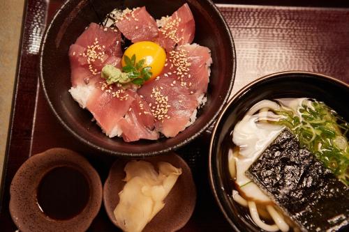 a tray with three bowls of food on a table at HOTEL MYTH-CLUB -ホテル マイス クラブ- Adult Only in Kyoto