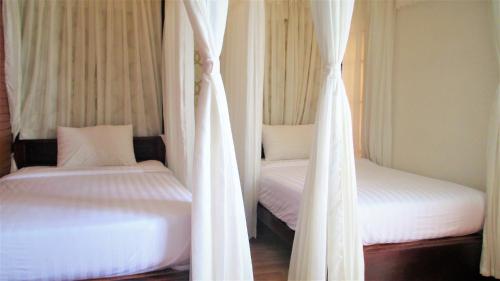 Postel nebo postele na pokoji v ubytování Anh Dao Mekong 2 Hotel