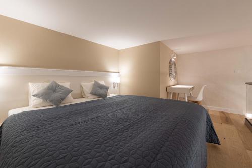 Posteľ alebo postele v izbe v ubytovaní Ozone One Apartment