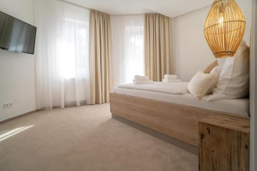 Postel nebo postele na pokoji v ubytování Hotel U Kaplicky