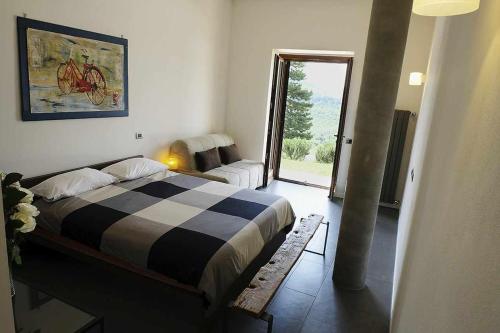 Posteľ alebo postele v izbe v ubytovaní San Venanzo - Casale de Conti