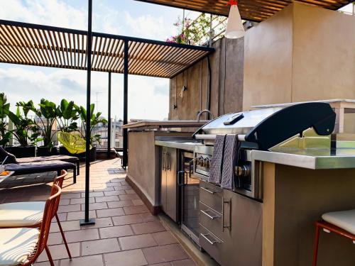 Incredible 2BR Penthouse with Urban Rooftop Garden