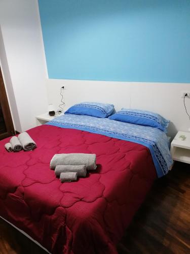Een bed of bedden in een kamer bij Casa Alessia