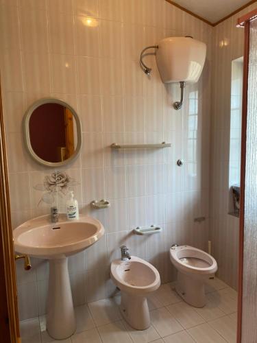 Koupelna v ubytování Residenza Miramonti