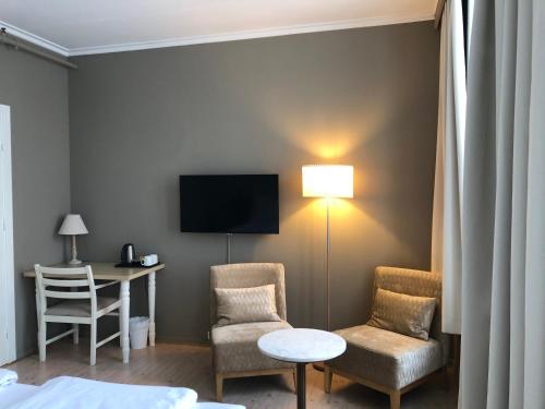 Risør Hotelにあるテレビまたはエンターテインメントセンター