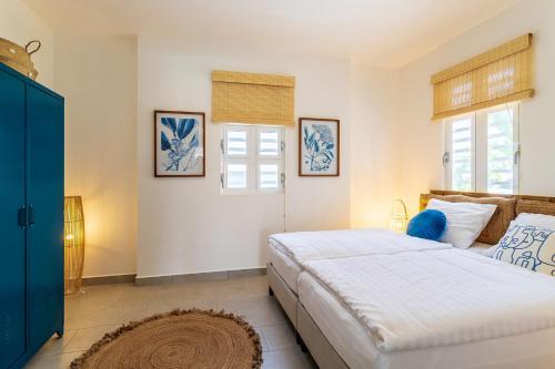 Cama ou camas em um quarto em Villa Laguna in Water Villas