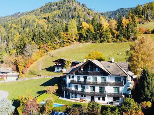 an aerial view of a house in the mountains at Sun Apartments - with Dolomiten Panorama in Lienz