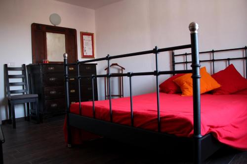 Ένα ή περισσότερα κρεβάτια σε δωμάτιο στο Casetta del Parione