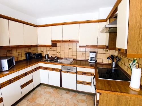 Kuchyň nebo kuchyňský kout v ubytování Modern Apartment Wissenbach 1