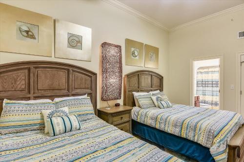 Postel nebo postele na pokoji v ubytování The Oasis at Orange Beach Unit 3007 (formerly Phoenix West II)