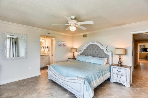 a bedroom with a bed and a ceiling fan at Phoenix 6 Unit 1015 in Orange Beach