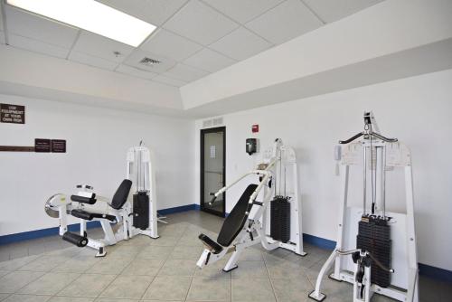 a gym with treadmills and ellipticals in a room at Phoenix 6 Unit 1015 in Orange Beach