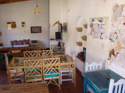 a room with a table and a table and chairs at La Casa Chica in Maimará