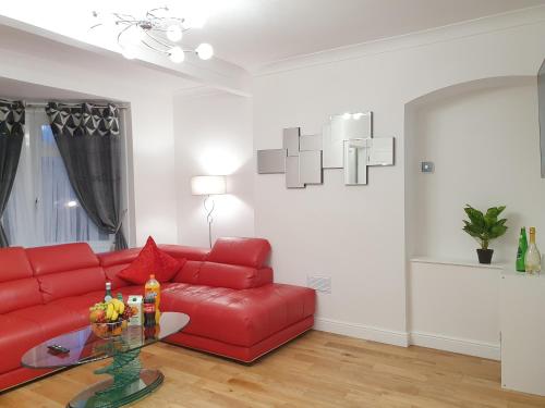 Uma área de estar em Glasgow Comfortable and Modern 3 Bedroom Mid Terraced Villa