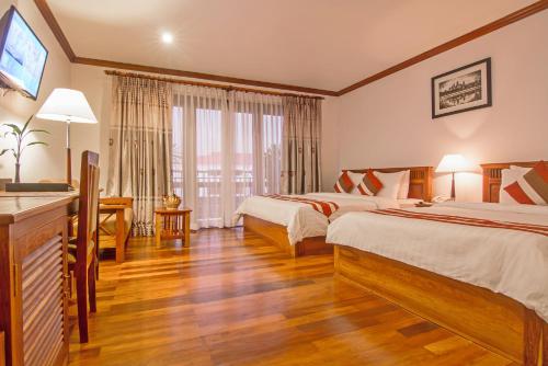 Lova arba lovos apgyvendinimo įstaigoje Cheathata CTS Hotel Siem Reap